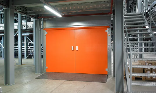entrance to a sherpa lift in a warehouse